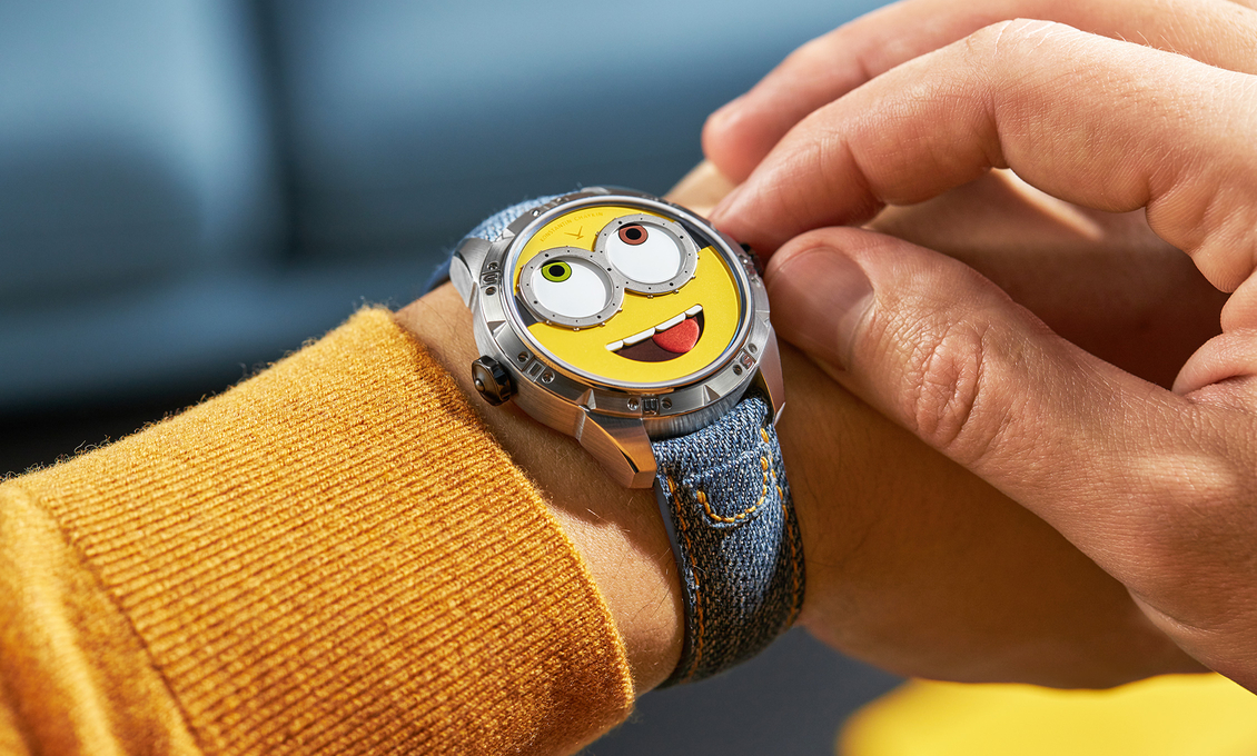 Wristshot Minions watch with with a yellow sweater